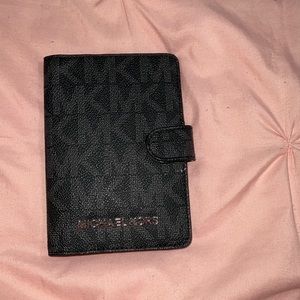Black Michael Kors passport holder